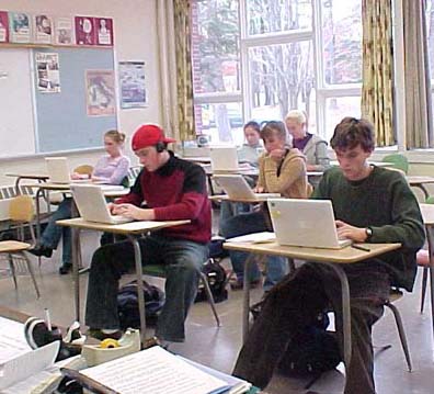 classroom and kids with wireless laptops