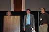 Joan Krone, David Schneider & Kent Foster Announcing Winners of ACM Student Research Competition